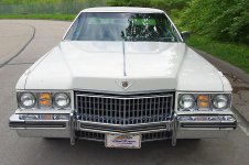 800px-1973_Cadillac_Sedan_Deville_Cotillion_White_front.jpg