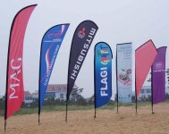 flying_banner_feather_flag_beach_flag_outdoor_display.jpg